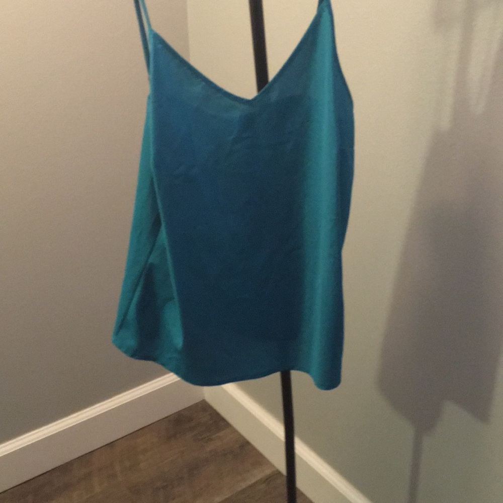 Two pajama pants with one pajama tank top